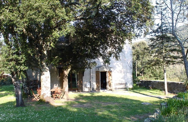 House of character in garden near sea and river