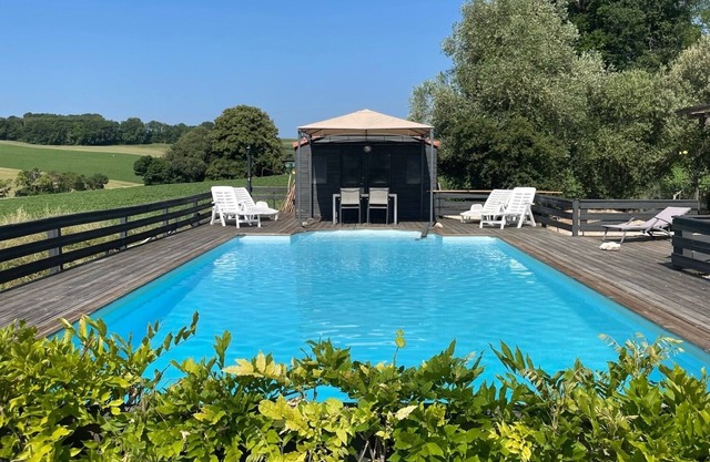 House with an amazing view, private pool, yet only 8 mins walk to town.
