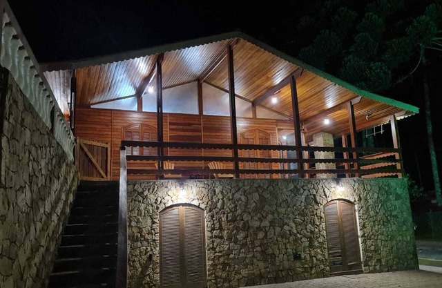 House with fireplace and game room