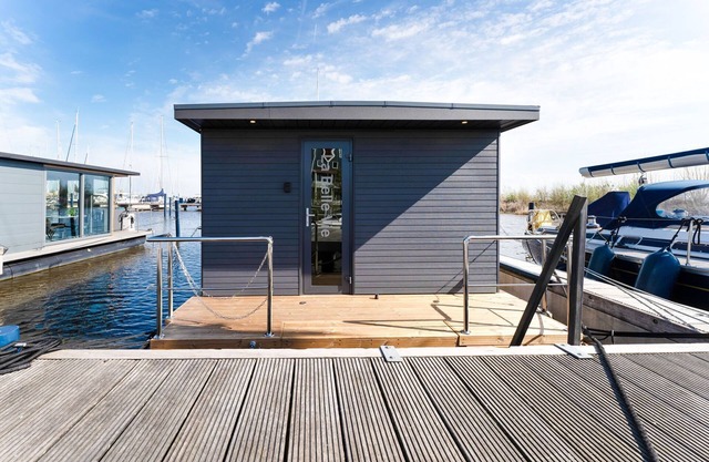 Houseboat in Volendam by Ijsselmeer