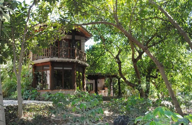 Idyllic cottage in the middle of nature close to river