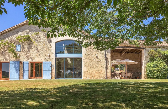 Idyllic country house with pool in a beautiful landscape.