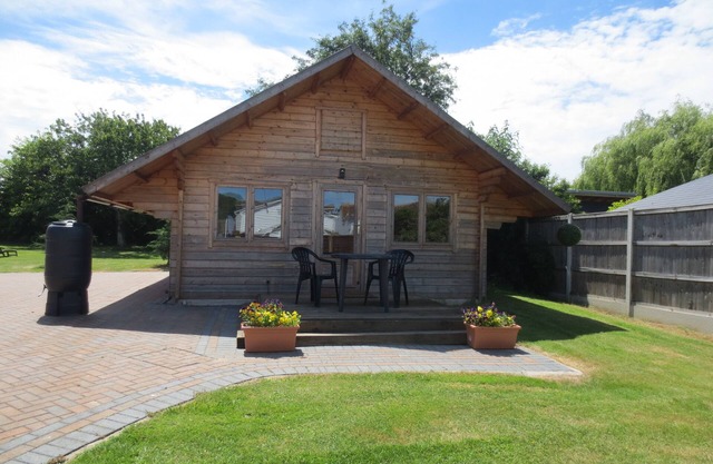 Idyllic Log Cabin in the garden of England