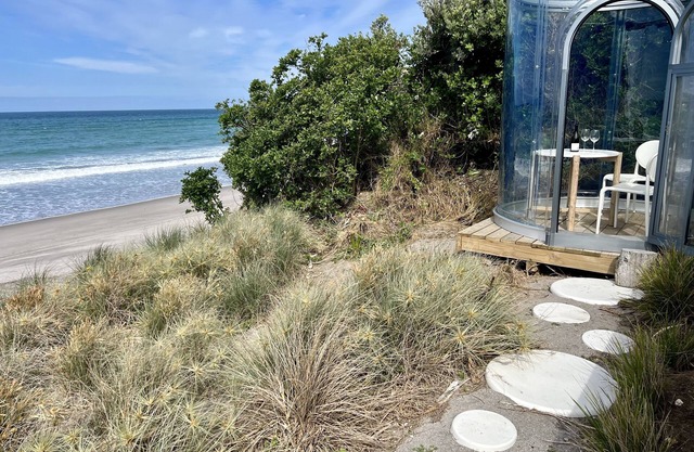 Idyllic Pukehina oceanfront hideaway