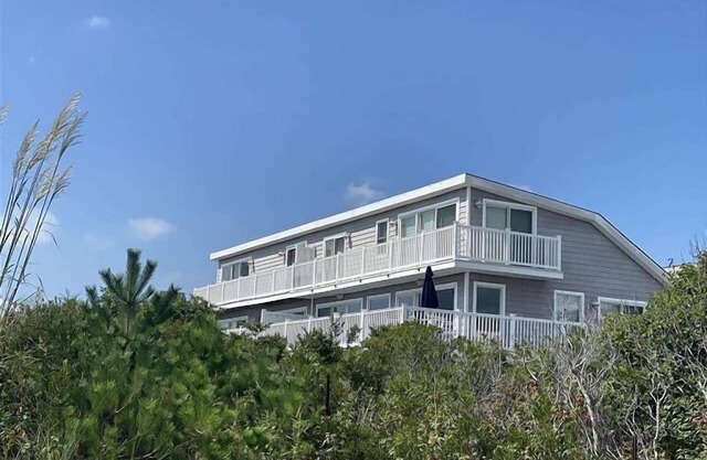 Immaculately Renovated Beachfront Townhome with Incredible Views!