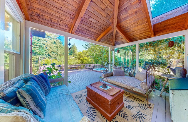 Inviting dog-friendly home with hot tub, fireplace, charming patio, & W/D