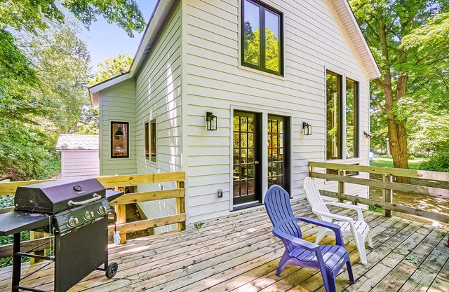 Inviting home in great location with large deck, firepit, gas grill & streaming