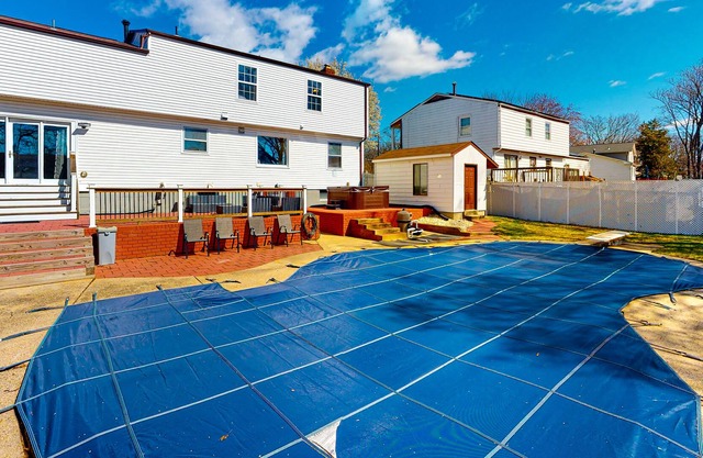 Inviting home with pool, hot tub, enclosed yard