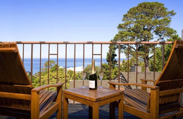 Jacuzzi and fireplace villa with ocean views of Point Lobos and dramatic sunsets