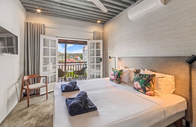 Junior Suite with balcony and city view