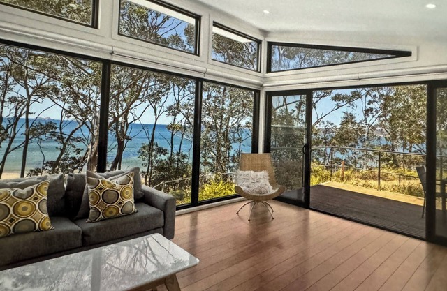 Karana Beach House - a serene coastal haven just a 2-minute walk from the beach.
