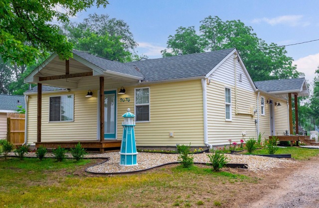 Lake front home with access to two lakes, large yard and RV hookup available!
