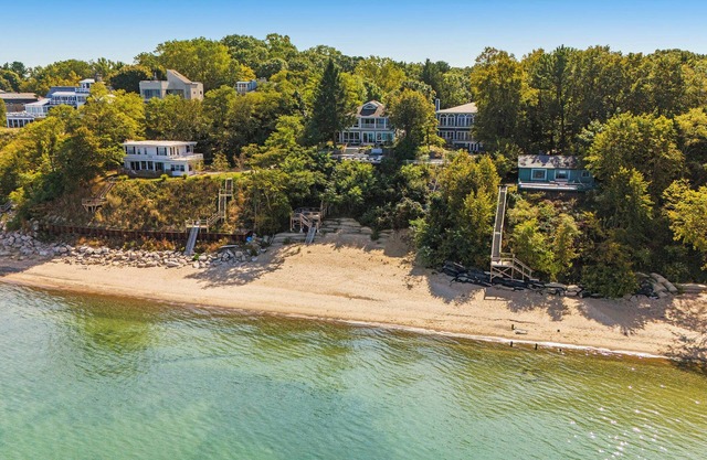 Lake MI Beach Front Home w/Private Pool, Hot Tub, Home Gym & 6 Ensuite Bedrooms!