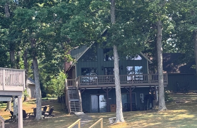 LAKE PERFECTION! Majestic views, A+ Location, TWO story dock. Pristine and comfy
