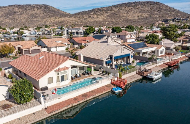 Lakefront Home complete with Mountain Views, Pool, Putting Green & Paddle Boat!