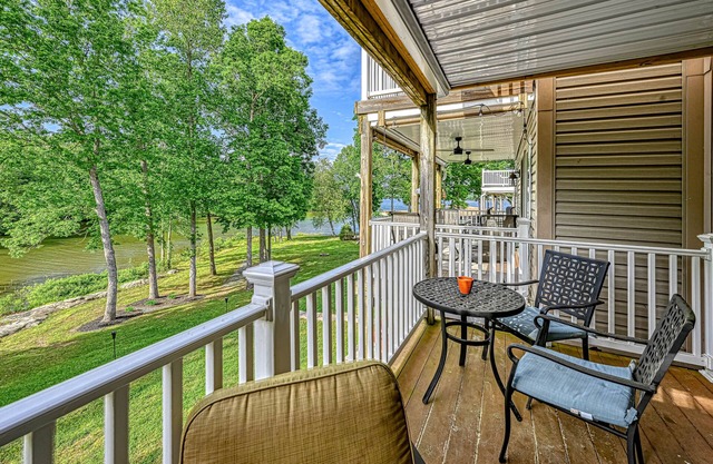 Lakefront home with kayaks, private patio, air hockey, grill, & balcony