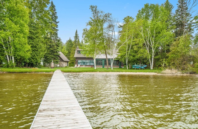 Lakefront home with Platte Lake views - private dock, kayaks & paddleboards