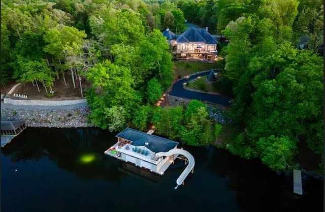 Lakefront Water Slide Sauna Pool Hot Tub Dock