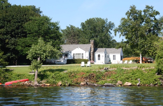 Lakeside cottage with west shore island sunsets and views of the Adirondacks.