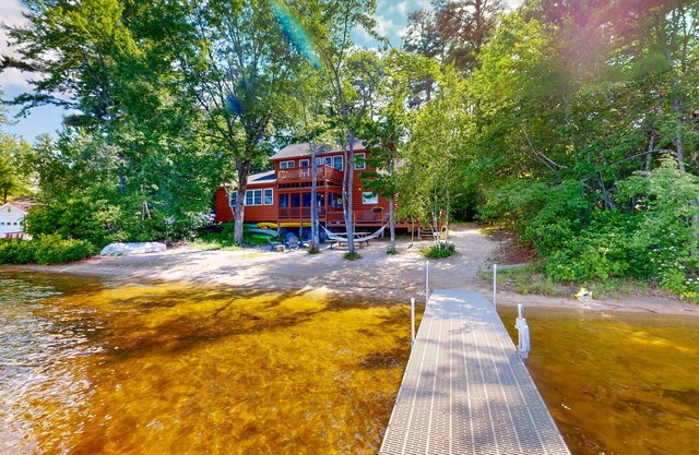 Lakeside home with private dock, firepit, grill, scenic balcony, fireplace & AC