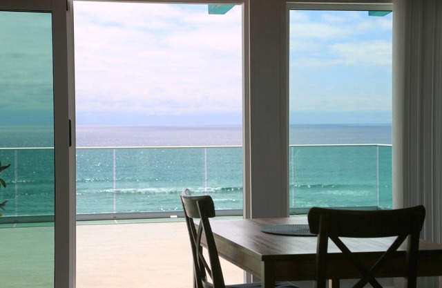 Large beachfront loft apartment in gated community Playa La Misión with deck.