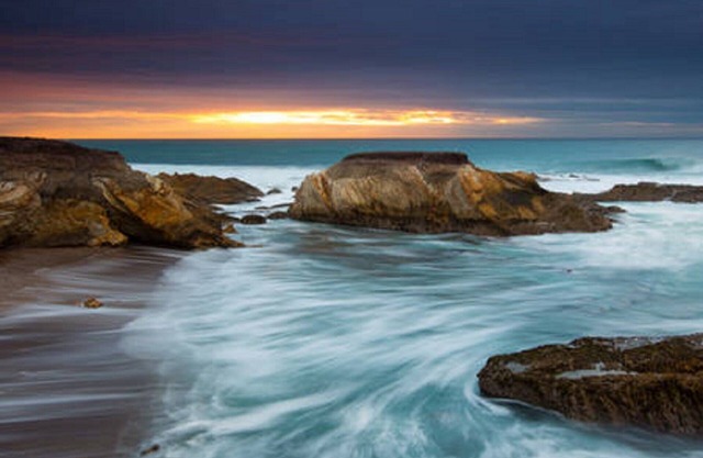 Light and airy sanctuary one block from the water