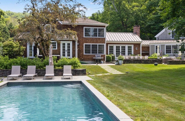 Live the good life in this luxury Lake Waramaug retreat!