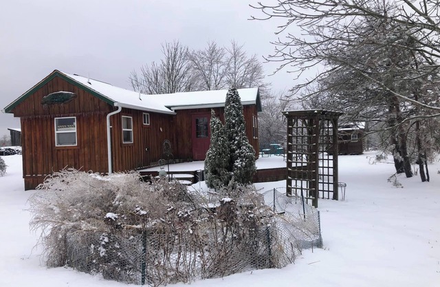 Located behind a tree filled garden near our horse barn and Farm Sanctuary.