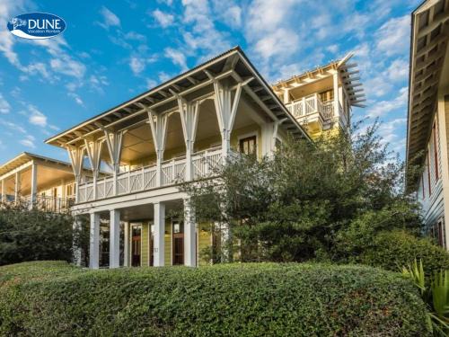 Located right on 30A, '57 Western Lake Drive' is a 6BR 6,5BA Home Carriage House home