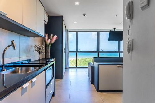 Loft Frente al Mar | Vista Río | Piscina & Sauna