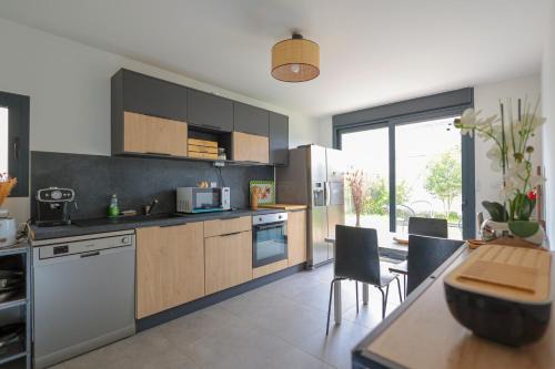Logement cosy neuf avec jardin