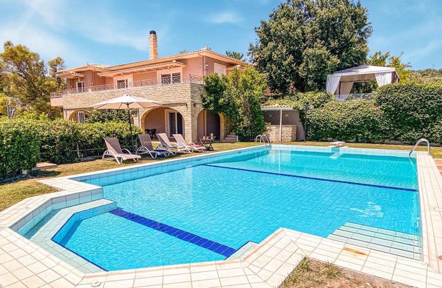 Look forward to a breathtaking view from the sunny terrace of this vacation home with pool!