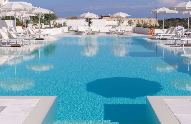 Lovely apartment for 4 people with A/C, pool, WIFI, TV, terrace, pets allowed and parking
