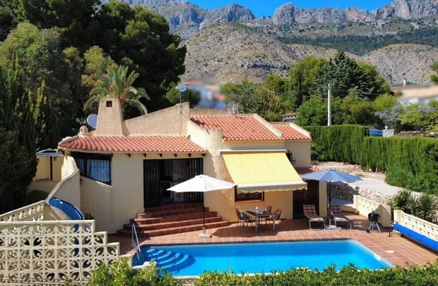 Lovely holiday home with a sun terrace, pool and own garden