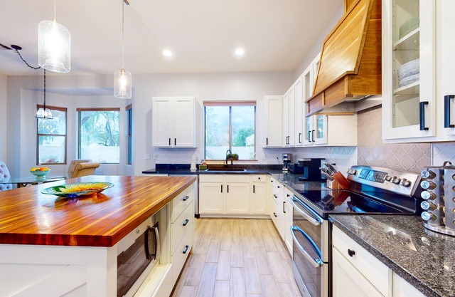 Lovely home with pool, enclosed yard, central AC, & washer/dryer