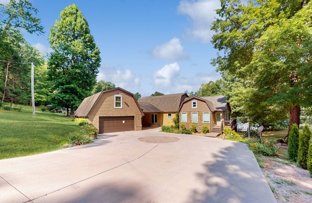 Lovely lakefront home with fire pit, fireplace, dock and gas grill