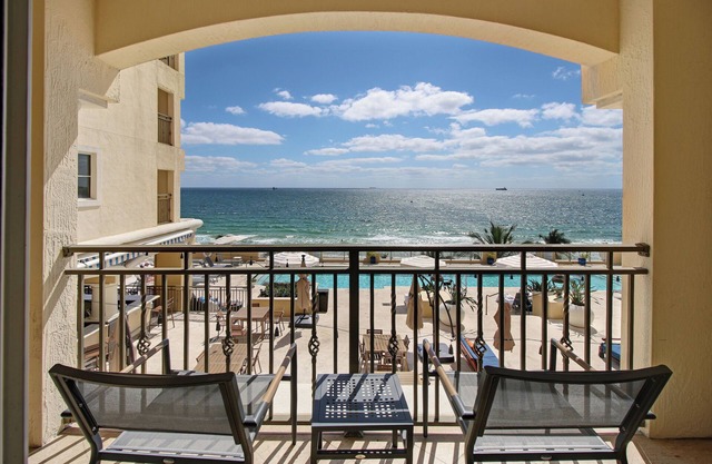 LOW PRICE but HIGH ENJOYMENT! Wake up to oceanfront views from your 2 Queen beds