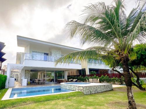 Luxo pé na areia com piscina e jacuzzi - 6 suítes