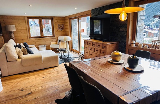Luxurious 3-room apartment with garden, near ski lift, private parking