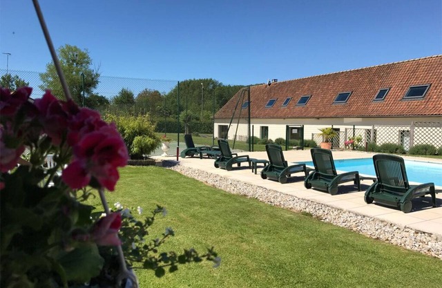 luxurious villa in the north of France with swimming pool and tennis court
