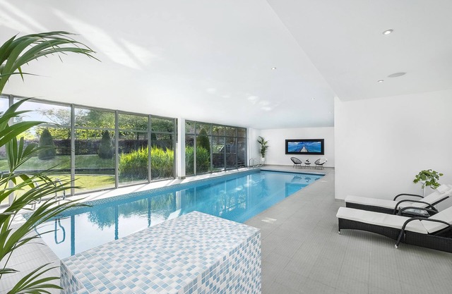 Luxury 10,000 Sq Ft 7-Bed Mansion with Heated Indoor Pool, Cinema and Games Room