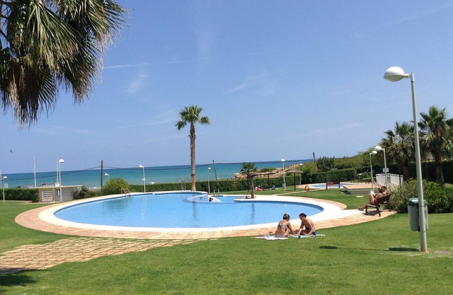 Luxury air conditioned beach front apartment with large patio.