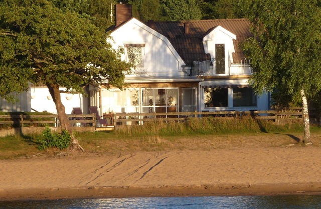 Luxury beach house with 3 bedrooms, directly on the sandy beach, evening sun, sauna, fishing
