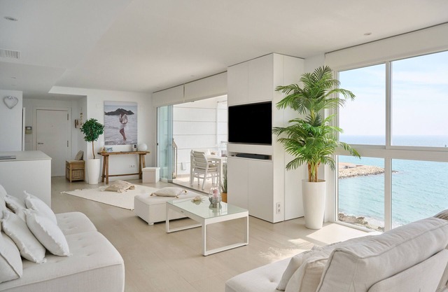 Luxury Beachfront Apartment with Sea Views, Pool, Garden & Wi-Fi