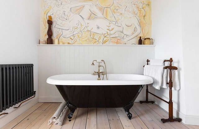 Luxury Cotswold cottage with valley views and stylish interiors.