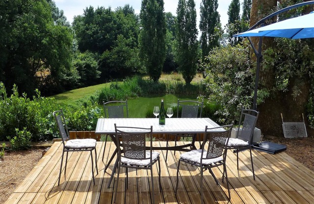 Luxury holiday home escape, set in an acre of private garden with its own lake