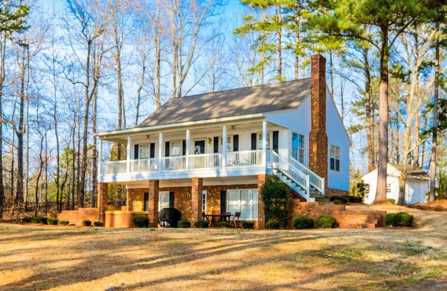 Luxury Lakefront Escape with Sunset Views, Private Boathouse, and Endless Fun!