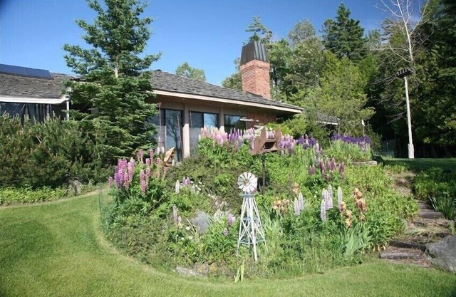 Luxury Lakefront Property with private dock, tennis court, trails & views