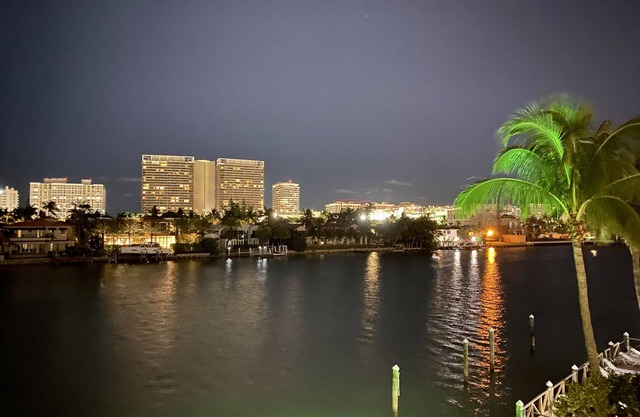 Luxury relaxation, stunning waterfront designer condo w/VIEWS. Shops & beaches.
