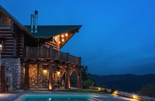 Luxury secluded mountain log chalet with pool (shared)